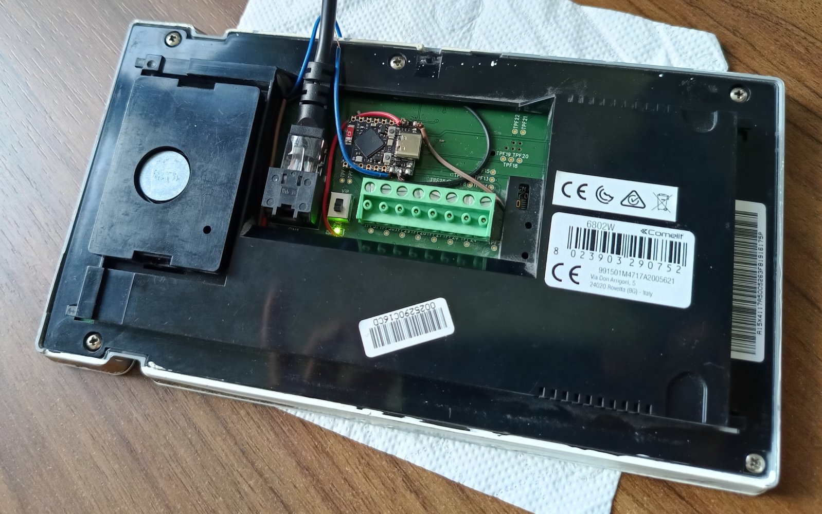 Alpha Bits module fitted inside the rear service bay of a Comelit 6802W monitor